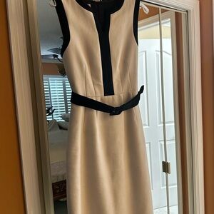 Beige and black belted above knee dress